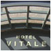 A large glass marquee graces the entrance at Hotel Vitale, San Francisco.