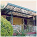 Burlingame, CA: A large glass canopy, like a jewel on a crown, protects this home's atrium entrance.