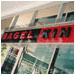 Bagel King: Plastic channel letters on plastic and perforated metal background.