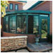 This curved sunroom in complements and enhances the architecture of the home. Los Altos, CA.