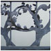 Iron bar and sheet are distressed with tools and paint color to create natural forms.