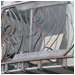 Elaborate metal work balcony with unique braces grace this storefront.
