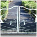 Reminescent of Mt. Diablo, this gate enhances and protects this driveway.