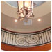 Ornamental iron can be curved to augment the surrounding architecture.