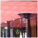 These drapes are adjustable to allow just the right amount of light to create this rosy outdoor dining area.