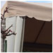 Free-standing cabana with curtains.